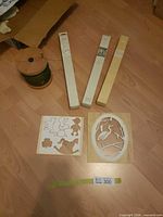 Overall lot with spool, four boxed patterns, two wooden templates