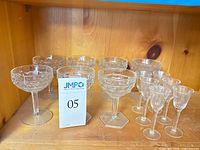 Group view of all 12 stemware pieces on shelf