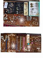 Overview of trays with earrings, brooches, rings, watches, bracelets and hoop earrings