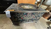 front and side view of blanket chest with floral tray atop