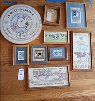 All nine framed prints laid out to show subjects, frames and relative sizes