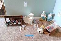 All lot contents arranged on floor against wall
