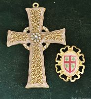 Front view of both pendants showing design, colors and relative sizes