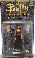 Front view of sealed Drusilla action figure with accessories in blister packaging