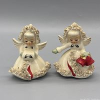 Front view of both angel shakers showing color and design