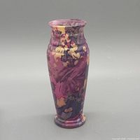 Full frontal view of marbled art glass vase