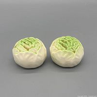 Top view of both cabbage shakers showing coloration and form