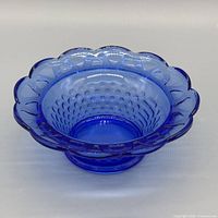 oblique top-side view of cobalt blue hobnail pressed glass bowl