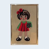 Front view of framed cross-stitch showing entire artwork and frame