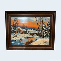 Full view of framed needlepoint showing winter landscape