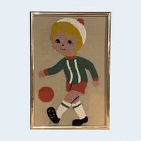 Front view of framed needlepoint showing full design and frame