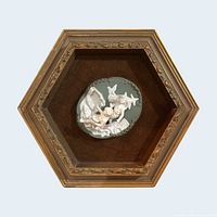 Front view showing hexagonal gilt frame, velvet backing, central sage jasperware-style medallion