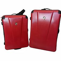 Front view of both red Heys suitcases showing size difference and hard shell