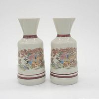 Full view of both matching porcelain sake pitchers