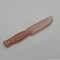 full view of pink glass knife