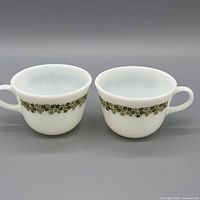 Front view of both Pyrex Spring Blossom teacups