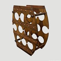 Angled view of wooden barrel-style wine rack