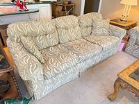front view of sofa showing cushions and pillows