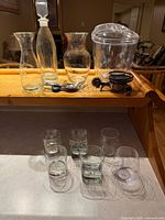 Group overview showing carafes, decanter, ice bucket, tools and glasses