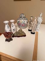 Group shot showing all eight Asian decor items