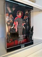 Front view of boxed Barbie Collector “Publicity Tour” doll on shelf