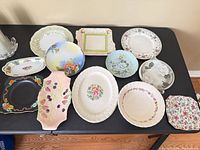 All twelve plates and platters laid out for overview