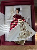 Barbie doll in gown inside foam packaging