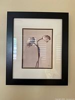 First framed floral print on wall