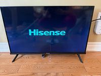 Front view of Hisense LED TV powered on