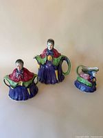 Three-piece figural tea set front view