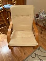 Front view of chair showing seat and back cushions