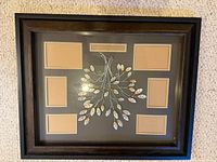 Full view of family tree frame showing photo openings and tree