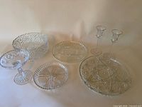 group shot of all seven glass and crystal pieces