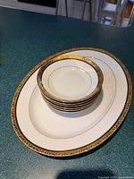 Top view showing platter with stacked bowls displaying rim pattern