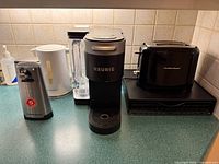 Group shot of all five countertop appliances on kitchen counter