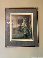 Full view of framed print on wall