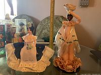 Both dolls side by side showing size comparison