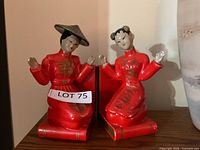 Front view of both ceramic figurine bookends