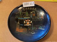 Front of black London landmarks plate