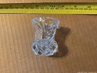 Crystal bud vase front view with tape measure showing height