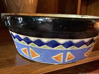 Side view showing full geometric pattern and black rim