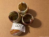 Top view showing four marble egg cups and decorative marble egg