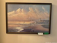 Full view of framed lighthouse print on wall