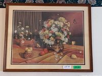 Full view of framed floral print on wall