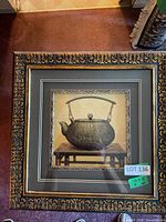 Front view of framed teapot print showing full frame, matting and image