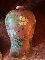 Full side view of pink ceramic floral vase