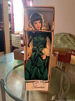 Full view of Scarlett porcelain doll inside original box