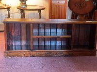 front view of solid wood shelving with three compartments