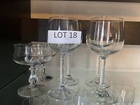 Group of stemmed glasses showing two styles