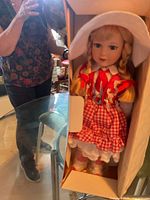 Full view of Sue Ellen porcelain doll inside original box